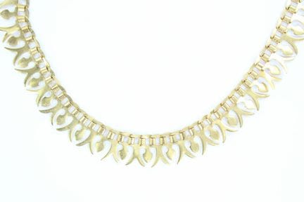 Collier collerette en or jaune 18 K à décor d'oves