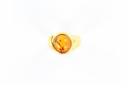 Bague en or jaune 18 K ornée d'une pierre couleur 