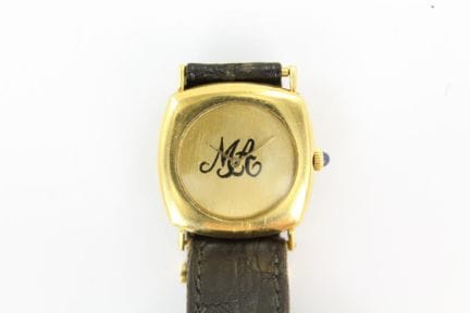 Boucheron
Montre de ville en or jaune 18K 750 mill