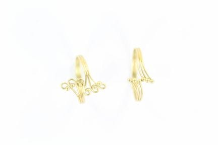 2 Ringe aus Gelbgold, der eine mit Flechtwerk-Moti