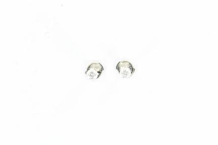 Pair of 18K gold earrings set with diamonds weighi