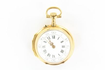 Collar watch with a yellow gold case; the back is 