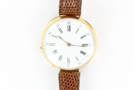 Montre de dame en or jaune 18 K avec cuvette en mé