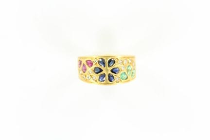 An 18K yellow gold band ring set with sapphires, r