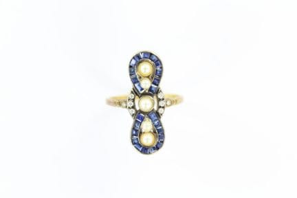 Bague avec monture en or jaune  18 K et chaton en 
