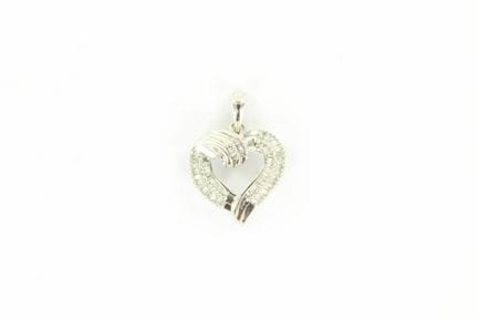 14K heart pendant set with baguette-cut diamonds. 