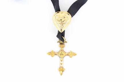 "Jeannette" cross pendant with a heart-shaped cuto