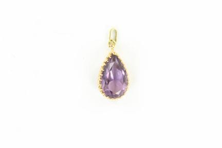 18K yellow gold pendant set with a teardrop-shaped