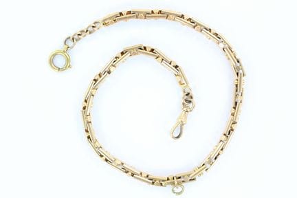 Chaine de montre en or jaune maille colonne. Long.