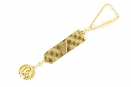 Key chain featuring a "Lion" zodiac medallion on a