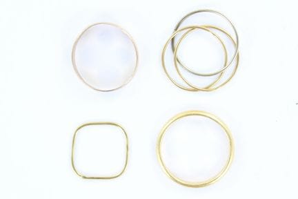 4 18K gold wedding bands, including one triple ban