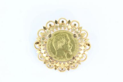 Broche en or jaune 18k de forme rayonnante ajourée