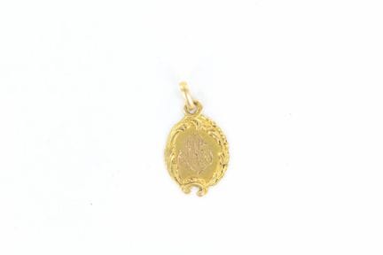 Médaille en or jaune 18 K chiffrée 
1 gr