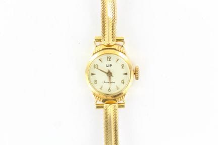 LIP Souveraine. Montre de dame en or jaune 18k, bo