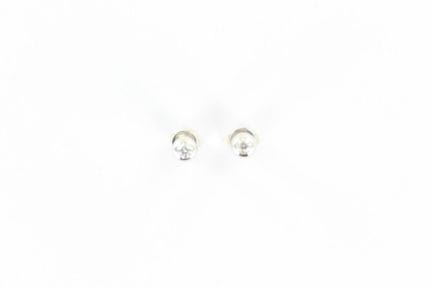 Paire de boutons d'oreilles en or blanc 18 K chacu