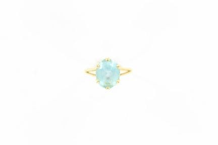 Bague en or jaune 18 K ornée d'une aigue marine ov