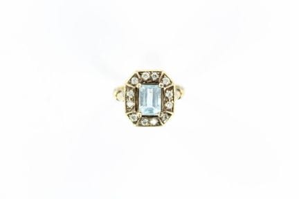 14 K yellow gold ring probably set with an emerald