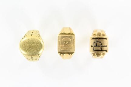 3 18K yellow gold signet rings with engraved numbe