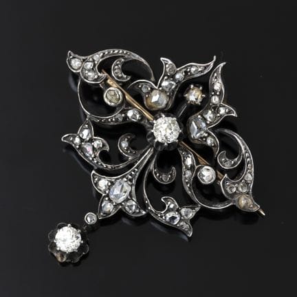 A brooch made of 750‰ gold and 800‰ silver, set wi