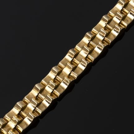 A flexible "Tank" bracelet in 750‰ yellow gold. 19