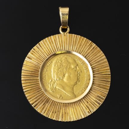 A 750‰ gold pendant set with a 20-franc gold coin 