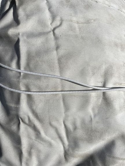 Large protective cover made of gray fabric 
560 x 