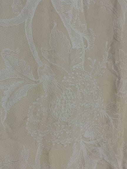Pair of large damask curtains with a cream backgro