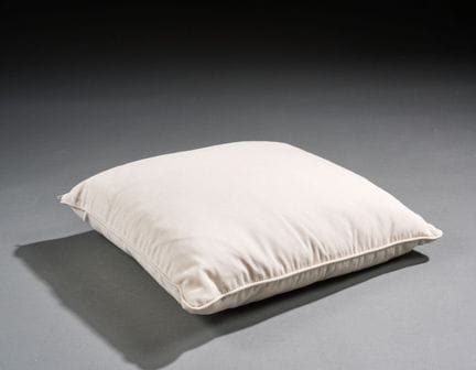 Set of four square cushions made of white fabric 
