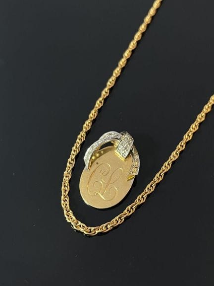 Chaîne et pendentif en or jaune et gris 18 k (750 