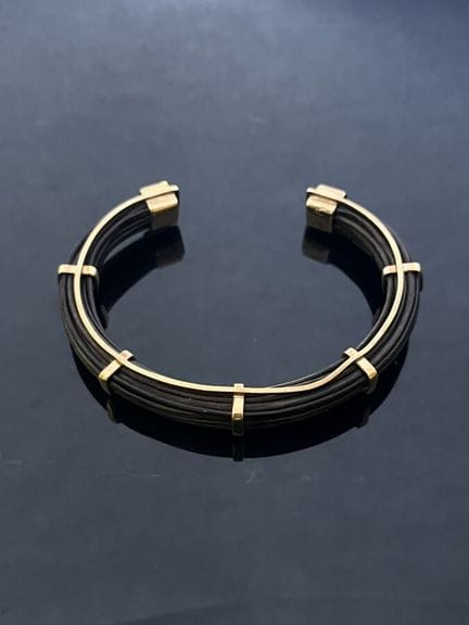 Torque-Armband aus 9-karätigem Gelbgold (375 Tause