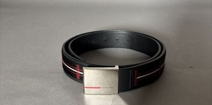 DIOR HOMME
Black, white, and red leather belt. 
Si
