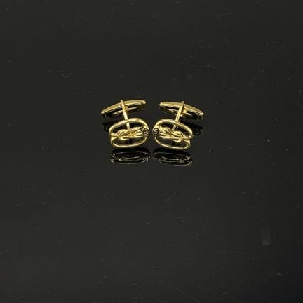 GUCCI - Paire de boutons de manchettes figurant de