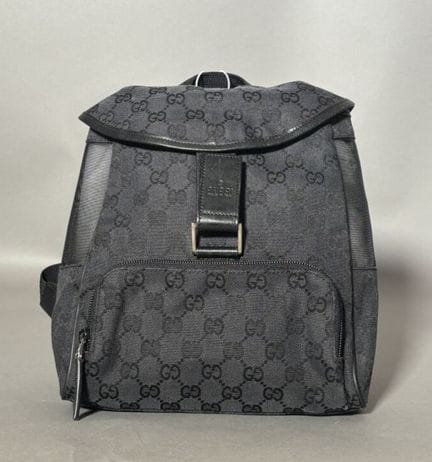 GUCCI
Small backpack in monogrammed canvas and bla