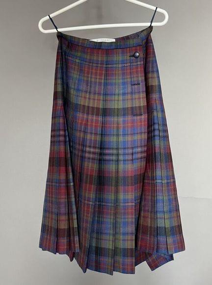NINA RICCI SHOPPING
Jupe mi longue Kilt porte feui