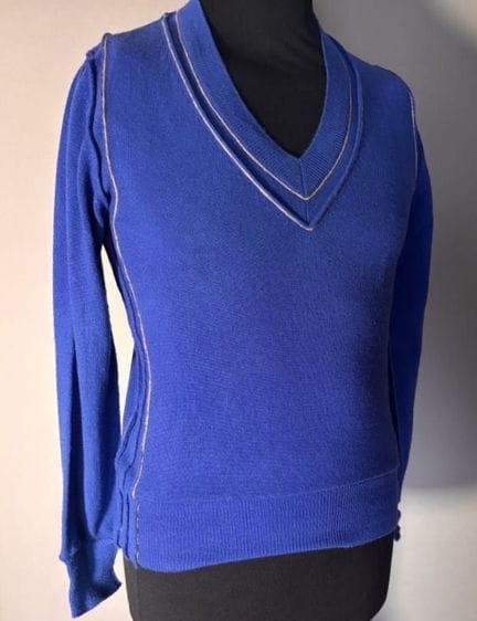 DOLCE &amp; GABBANA
Blue cashmere V-neck sweater. 