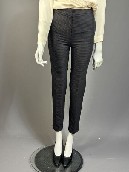 CHRISTIAN DIOR 
Pantalon noir à rayures horizontal