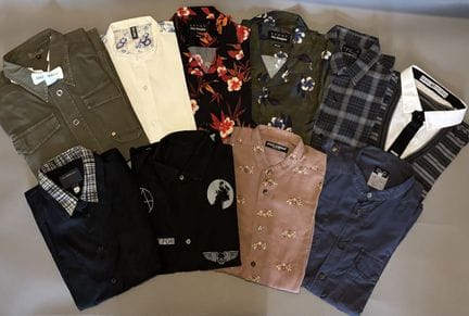Assortment of shirts from various brands, includin