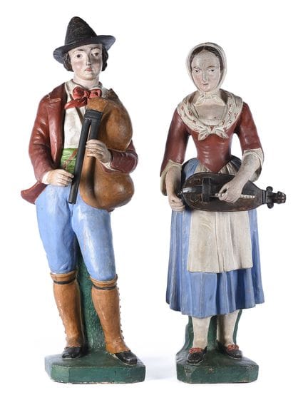Coppia di figure realizzate in terracotta policrom