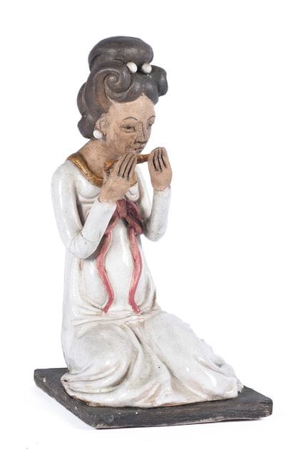 Statuetta in porcellana raffigurante un personaggi