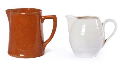 Set consisting of two glazed ceramic jugs. 20th ce