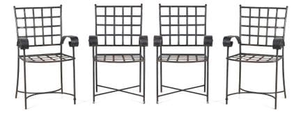 Set consisting of four wrought-iron garden chairs.