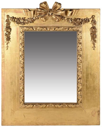 Mirror made of gilded wood. . 144x110 cm