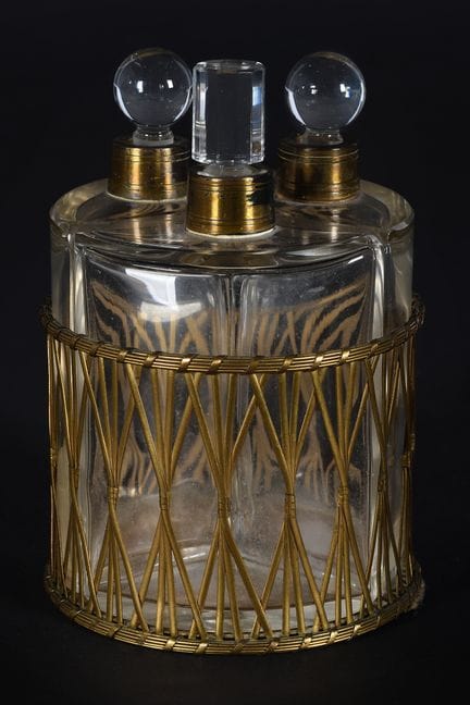 Set consisting of three glass and brass bottles, b