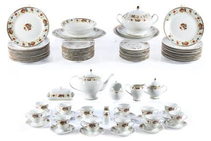 A 12-place setting of tableware made of Capodimont