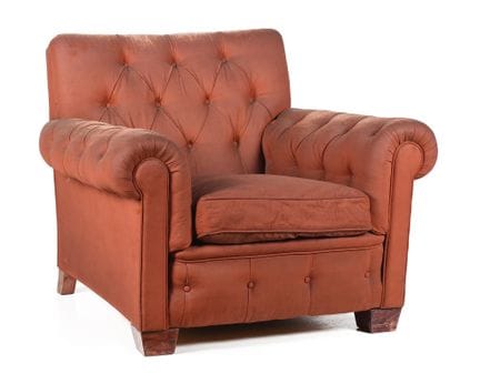 Chester armchair upholstered in leather. Minor imp