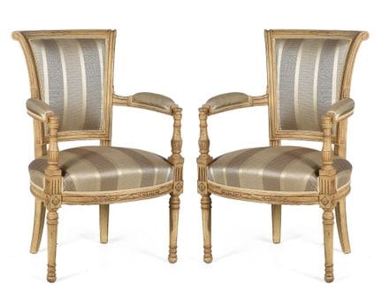 Pair of wooden armchairs with upholstered backs an