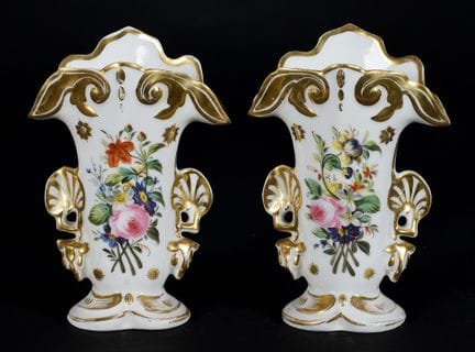 Pair of porcelain vases decorated with floral moti