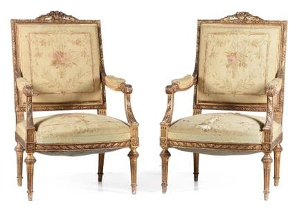 Pair of armchairs made of gilded wood and upholste