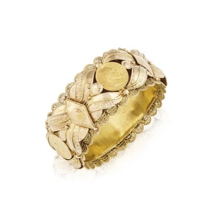 PULSERA DE MANGA CON MONEDAS DE ORO
Engastada con 