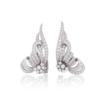 PENDIENTES DE DIAMANTES
Con motivos de cintas entr